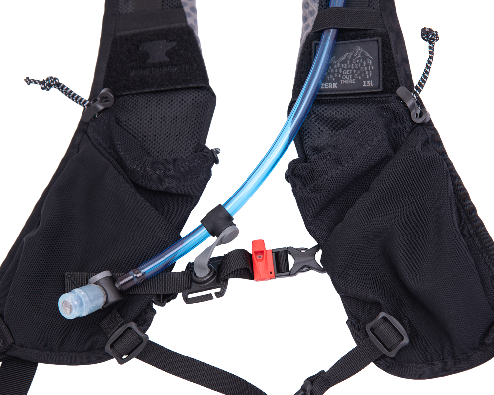 Zerk 13 w/2L Bladder
 hydration pack with a blue tube on a white background