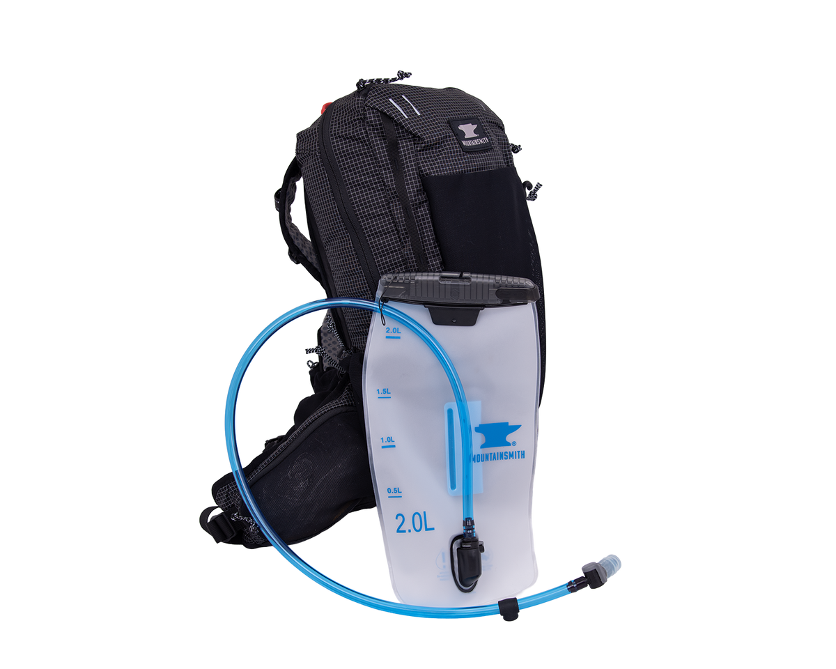 Zerk 13 Backpack w/2L Bladder
 hydration backpack with a white water bladder and blue tube on a white background