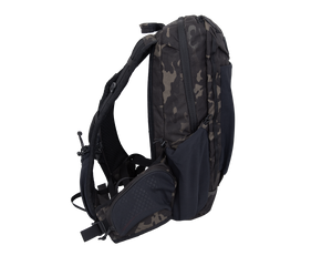 Close up of day pack shoulder strap with multiple pocket options showing cell phone carry on user&#39;s left strap