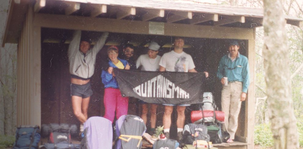 Team holding Mountainsmith banner - 40 Years of Innovation
